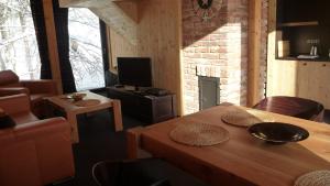 Posezení v ubytování Krakonošova Dílna "WOODHAUS"