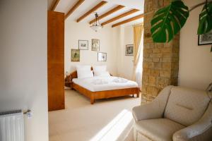 מיטה או מיטות בחדר ב-Zaivan Retreat