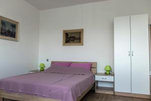 Posteľ alebo postele v izbe v ubytovaní Apartmani Borko