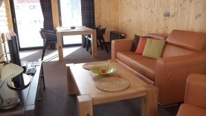 Posezení v ubytování Krakonošova Dílna "WOODHAUS"