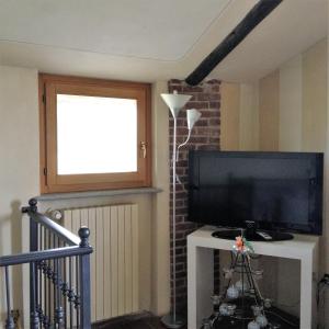 A television and/or entertainment centre at Cascina Garaita