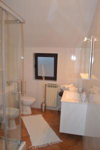 Kúpeľňa v ubytovaní Apartments Villa Holiday