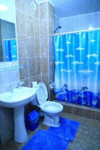 A bathroom at Khan Tengri Hotel