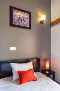 Postel nebo postele na pokoji v ubytování Riviera Hotel & Resort Kep