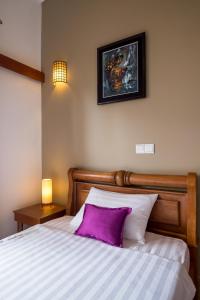 Postel nebo postele na pokoji v ubytování Riviera Hotel & Resort Kep