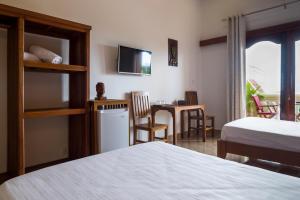 Postel nebo postele na pokoji v ubytování Riviera Hotel & Resort Kep