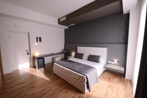 Postel nebo postele na pokoji v ubytování Sicilia Hotel Spa