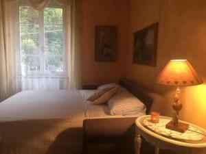 Posteľ alebo postele v izbe v ubytovaní La casa del cuore
