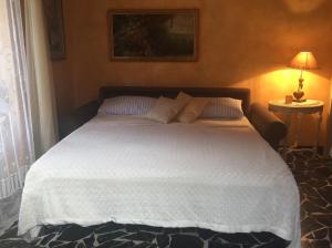 Posteľ alebo postele v izbe v ubytovaní La casa del cuore
