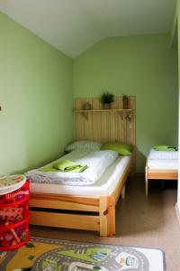 Un pat sau paturi într-o cameră la Apartman Sverana