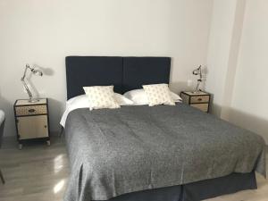 Postel nebo postele na pokoji v ubytování Dimora 16 Rooms & Garden