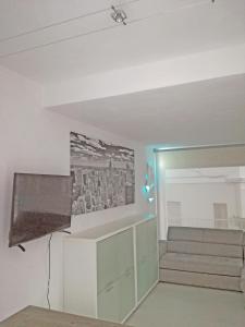 TV in/ali zabaviščno središče v nastanitvi bianco relax