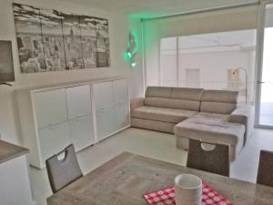 Predel za sedenje v nastanitvi bianco relax