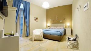 Ένα ή περισσότερα κρεβάτια σε δωμάτιο στο Beverello Suite