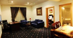 Χώρος καθιστικού στο Cayam Hotel