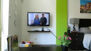 TV a/nebo společenská místnost v ubytování Apartamento Rulosol 1