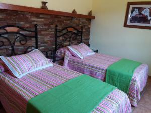 En eller flere senge i et værelse på Villa La Vista de Tefia + 63 billeder