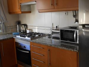 Køkken eller tekøkken på Albufeira Lovely new Apartment W/ Pool