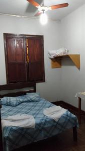 Katil atau katil-katil dalam bilik di Hotel Indaiá