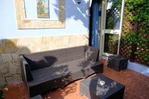 Ein Sitzbereich in der Unterkunft Hotel Villamare