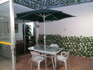 Patio nebo venkovní prostory v ubytování hotel medellin calasanz