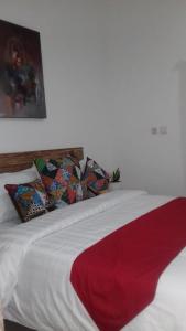 Postel nebo postele na pokoji v ubytování Anugrah Jaya Guest House