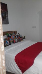 Postel nebo postele na pokoji v ubytování Anugrah Jaya Guest House