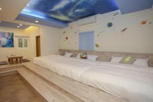 Ліжко або ліжка в номері Fa Dai Homestay