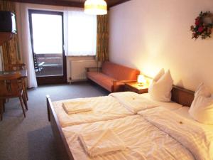 Postel nebo postele na pokoji v ubytování Haus Alpina by Châtel Reizen
