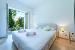 Posteľ alebo postele v izbe v ubytovaní Holiday Home Magud + 26 fotografií