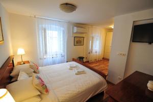 Posteľ alebo postele v izbe v ubytovaní House Vilović Korčula