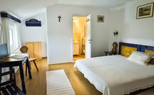 Postel nebo postele na pokoji v ubytování Casa Júlia