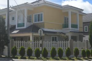 a house with a white fence at My Home N2 @ Golden Hills Night Market in Cameron Highlands