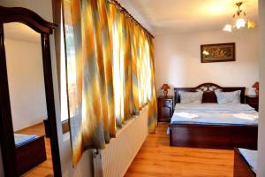 Llit o llits en una habitació de Guest House Mavrudieva