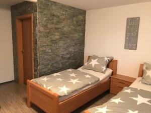 Postel nebo postele na pokoji v ubytování Ferienwohnung - Kurz