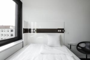 Postel nebo postele na pokoji v ubytování Wakeup Copenhagen - Borgergade