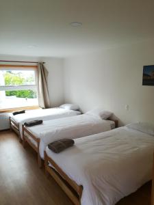 Voodi või voodid majutusasutuse Hostal Camino de Santiago toas