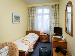 TV a/nebo společenská místnost v ubytování Hotel Union