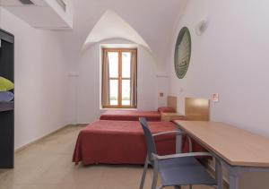 Postel nebo postele na pokoji v ubytování Albergue Inturjoven Córdoba