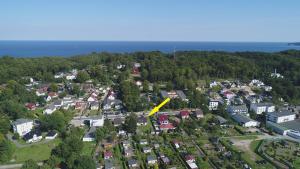 an aerial view of a town with a yellow arrow in the middle at Sonnenhus - Rügen in Ostseebad Sellin