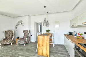 Posezení v ubytování Portes Suites & Villas Mykonos