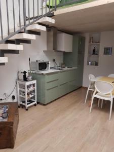 A kitchen or kitchenette at Domus Navigli