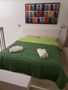 A bed or beds in a room at Domus Navigli