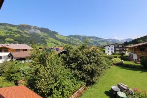 a view of a village with mountains in the background at Appartementhaus Kurz in Westendorf