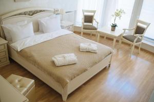 Postel nebo postele na pokoji v ubytování Svityaz Resort