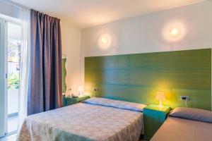 Ein Bett oder Betten in einem Zimmer der Unterkunft Hotel Montecristo
