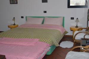 Postel nebo postele na pokoji v ubytování B&B Tenuta Zavaia