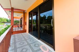 Balkón nebo terasa v ubytování Toongyoong Longbeach Resort SHA Plus