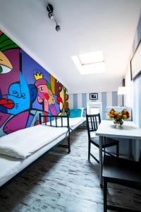 Postel nebo postele na pokoji v ubytování AB Hostel