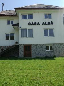 a building with the name casa alba on it at Casa Alba in Fundata